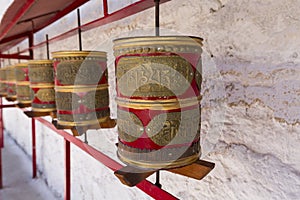 Tibetan prayer wheels or prayer`s rolls of the faithful Buddhist