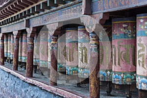 Tibetan prayer wheels at Sakya Monastery also known as Pel Sakya is a Buddhist monastery situated in Sa\'gya Town photo