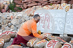 Tibetan rock painting artist