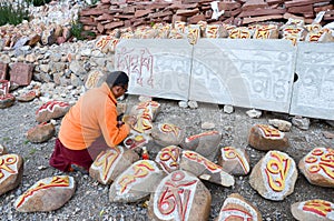 Tibetan rock painting artist