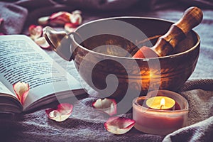 Tibetan singing bowl on the gray background