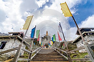 Tibetan Stupa with colorful buddhist prayer flags