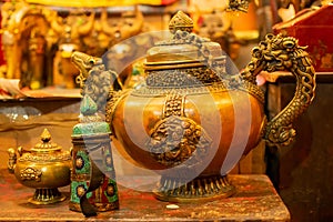 Tibetan tea pots with chinese dragons emblems for sale at Ladakh, India
