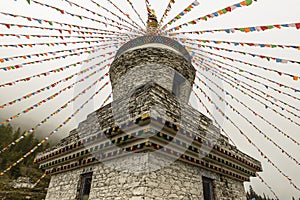 Tibetan white tower with Prayer Flags