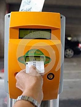 Ticket dispenser parking structure