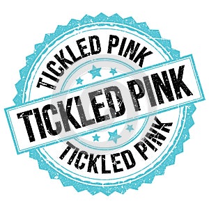 TICKLED PINK text on blue-black round stamp sign