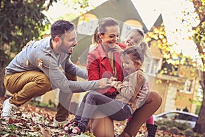 Tickling sister is fun. Family spending time together.