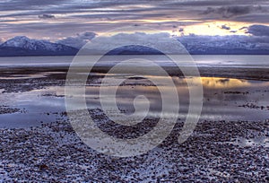 Tidal water flowing at sunset