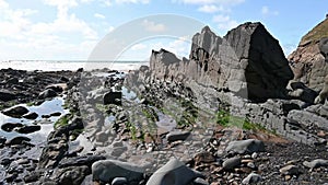 The tide is out at Duck Pool beach Cornwall