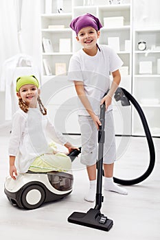 Tidy up day - children cleaning their room photo