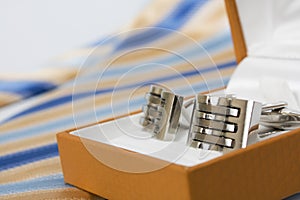 Tie, belt and cufflinks