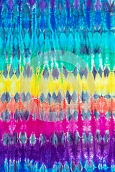 Tie dye pattern hand dyed on cotton fabric abstract background