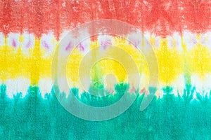 Tie dye pattern hand dyed on cotton fabric abstract background