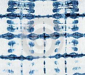 Tie-dye pattern of indigo color on white silk