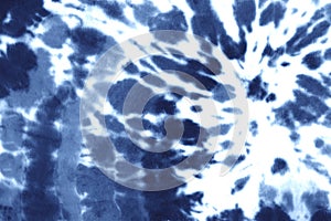 Tie dye spiral shibori indigo blue navy white watercolour abstract background