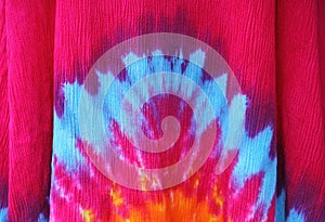 Tie dye star burst or floral pattern in blue pink