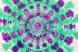 Tie dyed pattern on cotton fabric for background.