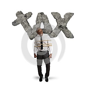 Tied businessman is crushed and oppressed by weight taxes