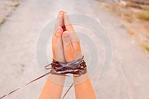 Tied hands, concept of lack of freedom and repression at different opinions