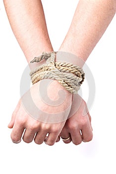 Tied hands on white background, isolated. Concept of limiting human rights, arrest