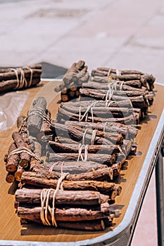 Tied licorice root sticks sold on street