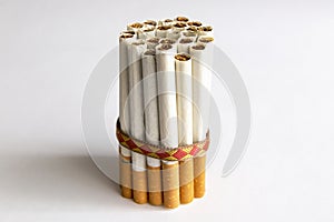 Tied in a pile of cigarettes on a white background.
