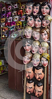 A tienda selling political and fun masks