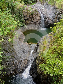 These are Tiered waterfalls along a hiking trail on Maui near the 7 Sacred Pools leading up to the bamboo forests