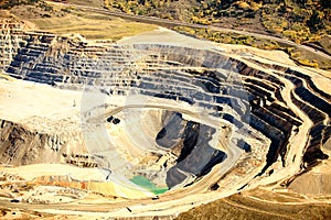 The tiers of an open pit copper mine.