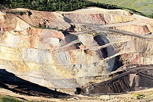 The tiers of an open pit phosphate mine.