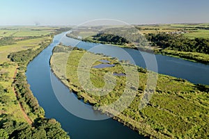 Tiete River opening into two channels photo