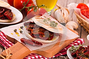 Tigella bread with sun-dried tomatoes.