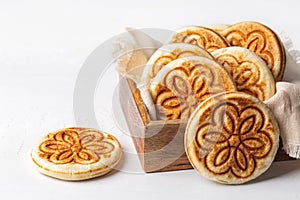 Tigelle or Crescentine, crescente. Thin round breads photo