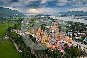 Tiger Cave Temple Wat Tham Sua in Kanchanaburi, Thailand is a beautiful day, so it is very popular with tourists and foreigners photo