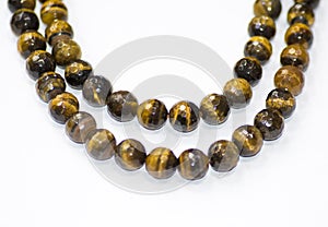 Tiger Eye mineral isolated on a white background