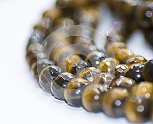 Tiger Eye mineral isolated on a white background