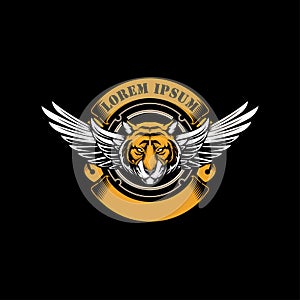 Tiger head cartoon with wing and ribbon vector emblem logo template