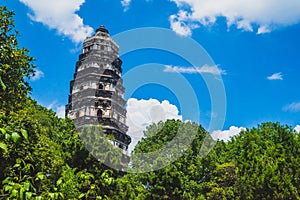 Tiger Hill Pagoda Pagoda of Yunyan Temple over trees on Tiger Hill Huqiu in Suzhou, Jiangsu, China