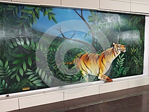 Tiger jumping from Jungle to wall