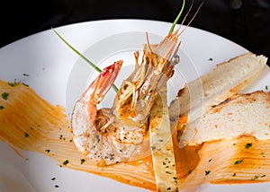 Tiger prawn with spicy sauce with nice decoration.