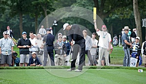 Tiger Woods Tees Off