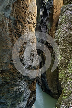 Tight canyon with a river running through it in Switzerland