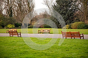 Tight frame with a few wooden benches near the Jubilee gates