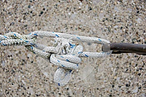 Tight knot with frayed rope