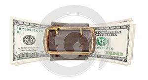 Tighten belt and stack of dollars photo