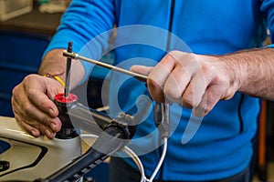 Tightening of a bicycle handlebar stem with the use of a small inbus wrench photo