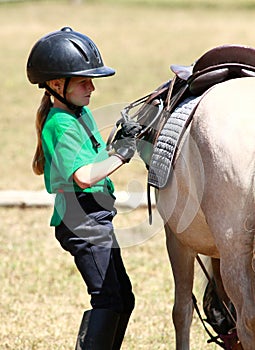 Tightening the Stirrups photo