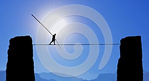 Tightrope Walker Balancing on the Rope