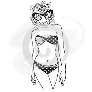 The tigress with the human body in a bathing suit. The girl with a beautiful body.