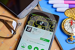 Tik Tok Dev on Smartphone screen.